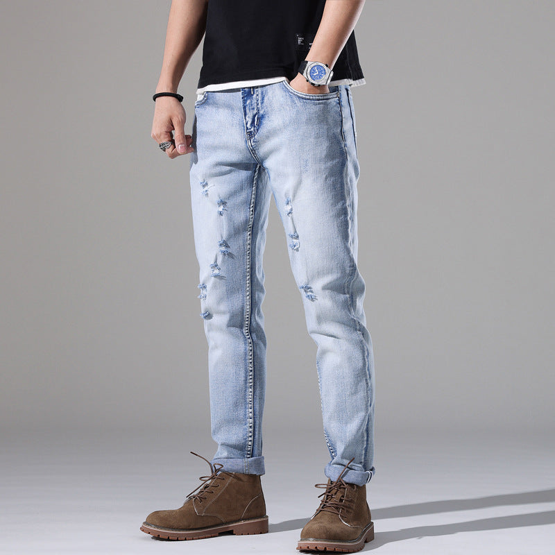 Moda Elite | Jeansy z podartymi nogawkami i dopasowanym krojem
