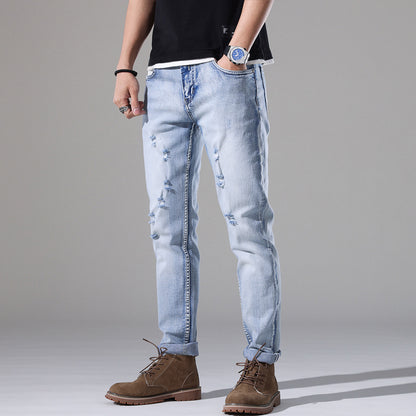 Moda Elite | Jeansy z podartymi nogawkami i dopasowanym krojem