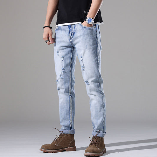 Moda Elite | Jeansy z podartymi nogawkami i dopasowanym krojem