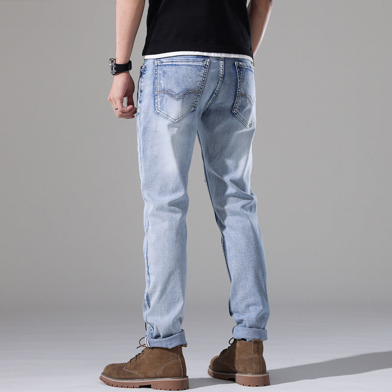Moda Elite | Jeansy z podartymi nogawkami i dopasowanym krojem