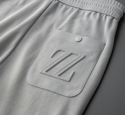 Moda Elite | Sportowe spodnie dresowe z haftem