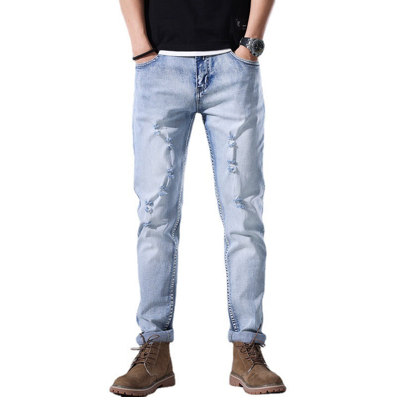 Moda Elite | Jeansy z podartymi nogawkami i dopasowanym krojem