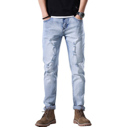 Moda Elite | Jeansy z podartymi nogawkami i dopasowanym krojem