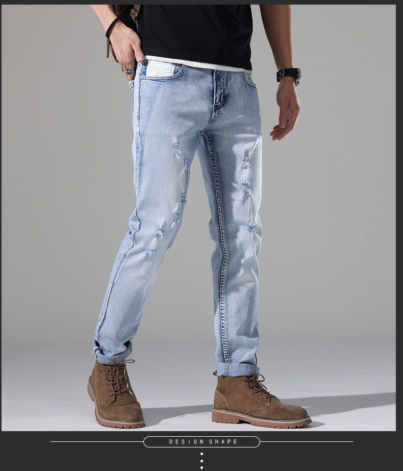 Moda Elite | Jeansy z podartymi nogawkami i dopasowanym krojem