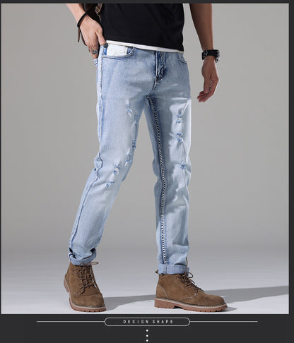 Moda Elite | Jeansy z podartymi nogawkami i dopasowanym krojem